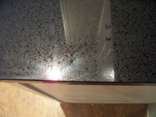Scratch on Black Night quartz countertop.