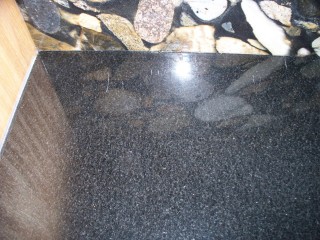 Scratches on Absolute Black granite