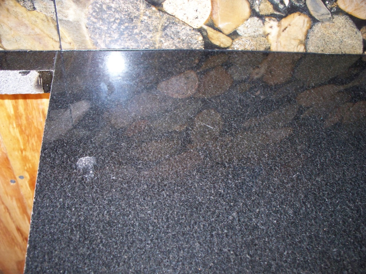 Scratches on Absolute Black granite. Granite, M.D.