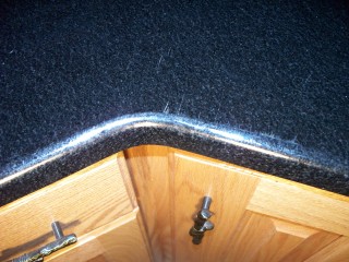 Scratches on Absolute Black granite.