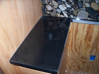Scratches repaired on Absolute Black granite.